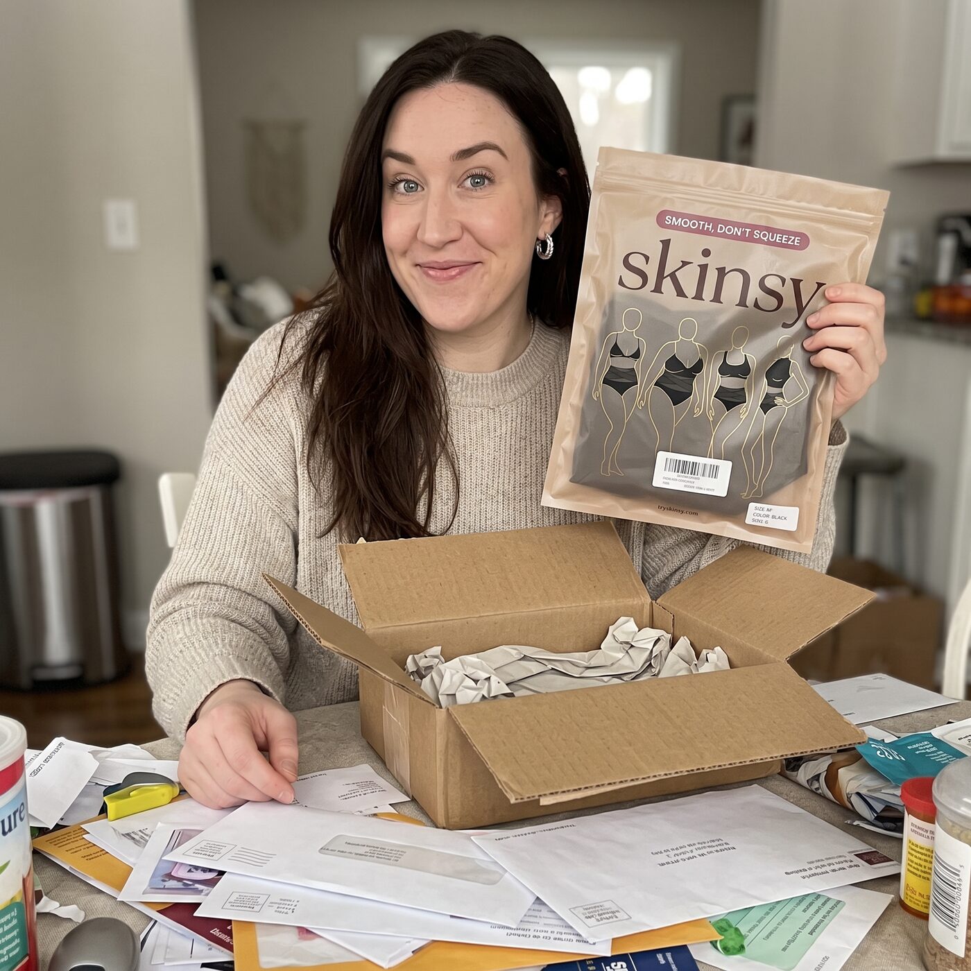 Opening the Skinsy parcel at the dining table