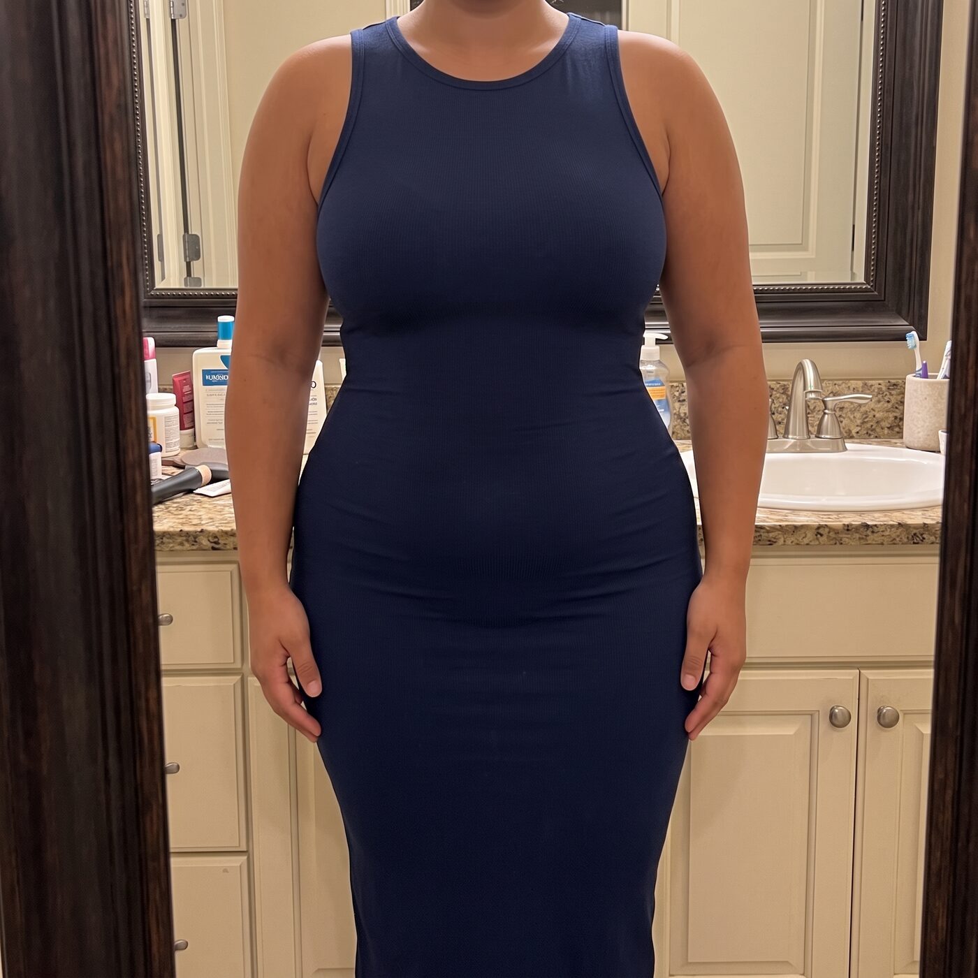 Navy fitted dress, smooth from the front